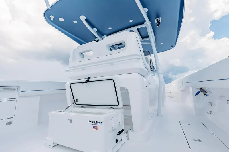 Slide: The Image of Manufacturer Provided Image: 2022 Intrepid 407 Nomad FE boat interior with open storage compartment. - 16