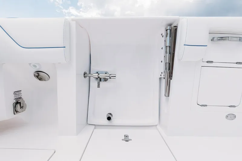 Slide: The Image of Manufacturer Provided Image: 2022 Intrepid 407 Nomad FE boat interior with white seating and fixtures. - 20