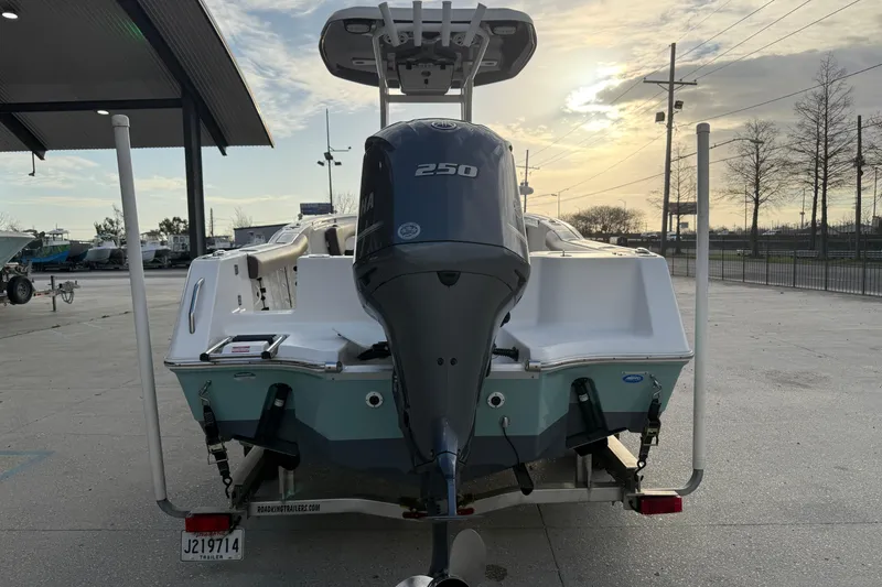 Slide: The Image of 2021 Tidewater 232 CC Adventure boat with Yamaha 250 engine at a marina. - 3
