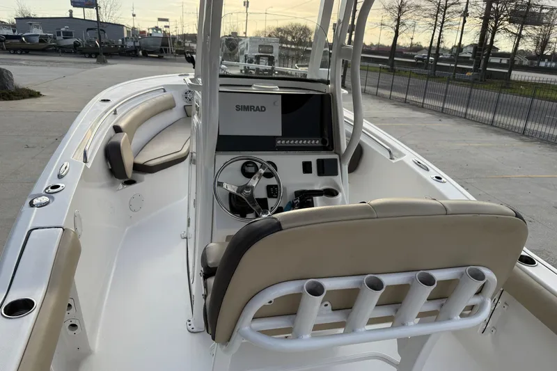 Slide: The Image of 2021 Tidewater 232 CC Adventure boat interior with Simrad navigation system. - 8