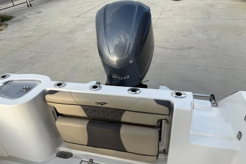 Slide: The Image of 2021 Tidewater 232 CC Adventure boat with powerful 250 horsepower engine. - 9