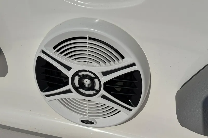 Slide: The Image of Close-up of a speaker on a 2019 Chaparral 21 H2O Sport OB boat. - 12