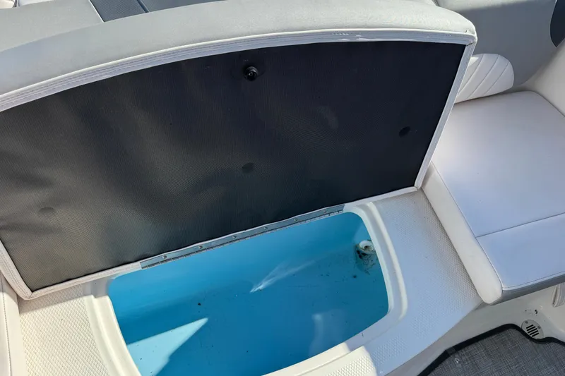 Slide: The Image of Open storage compartment in Chaparral 21 H2O Sport OB boat, 2019 model. - 13
