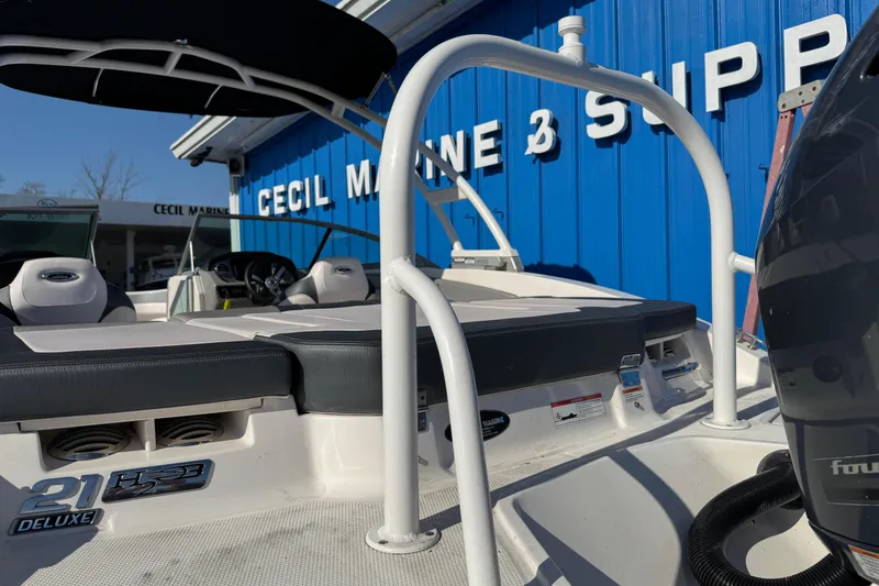 Slide: The Image of 2019 Chaparral 21 H2O Sport OB boat at Cecil Marine, showcasing seating and design. - 16