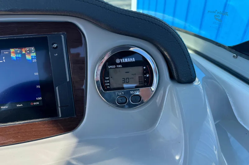 Slide: The Image of Dashboard of 2019 Chaparral 21 H2O Sport OB with Yamaha speedometer and display screen. - 21