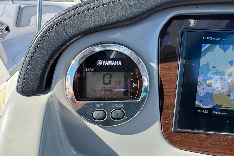 Slide: The Image of Dashboard of 2019 Chaparral 21 H2O Sport OB with Yamaha tachometer and GPS display. - 23