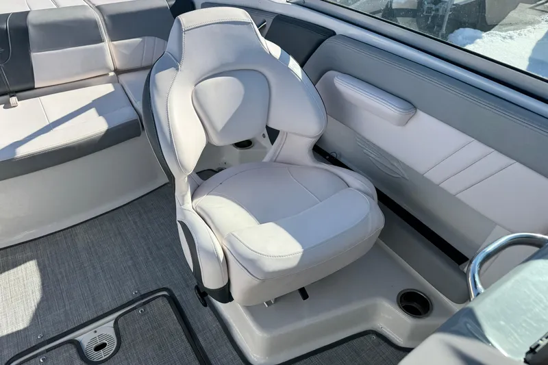 Slide: The Image of 2019 Chaparral 21 H2O Sport OB interior with plush seating and modern design. - 28