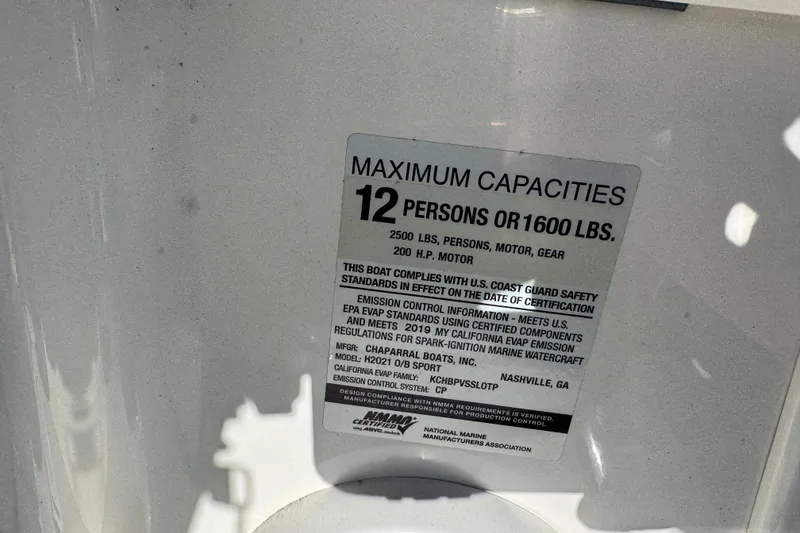 Slide: The Image of 2019 Chaparral 21 H2O Sport OB capacity label, max 12 persons or 1600 lbs. - 31