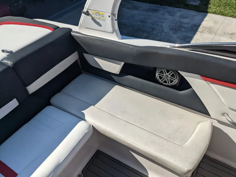 Slide: The Image of Interior seating of 2014 Four Winns H230SS boat with stylish upholstery. - 4