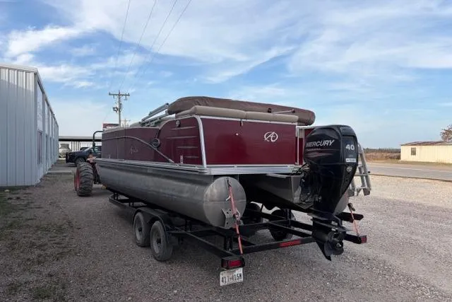 Slide: The Image of 2014 Avalon Catalina Cruise 22' pontoon boat on trailer with Mercury 40 outboard motor. - 4