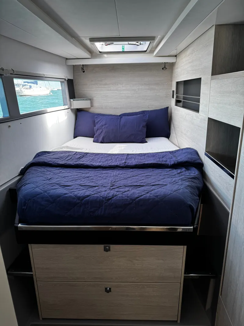Slide: The Image of Interior of a 2019 Leopard 45 yacht with cozy bed. - 22