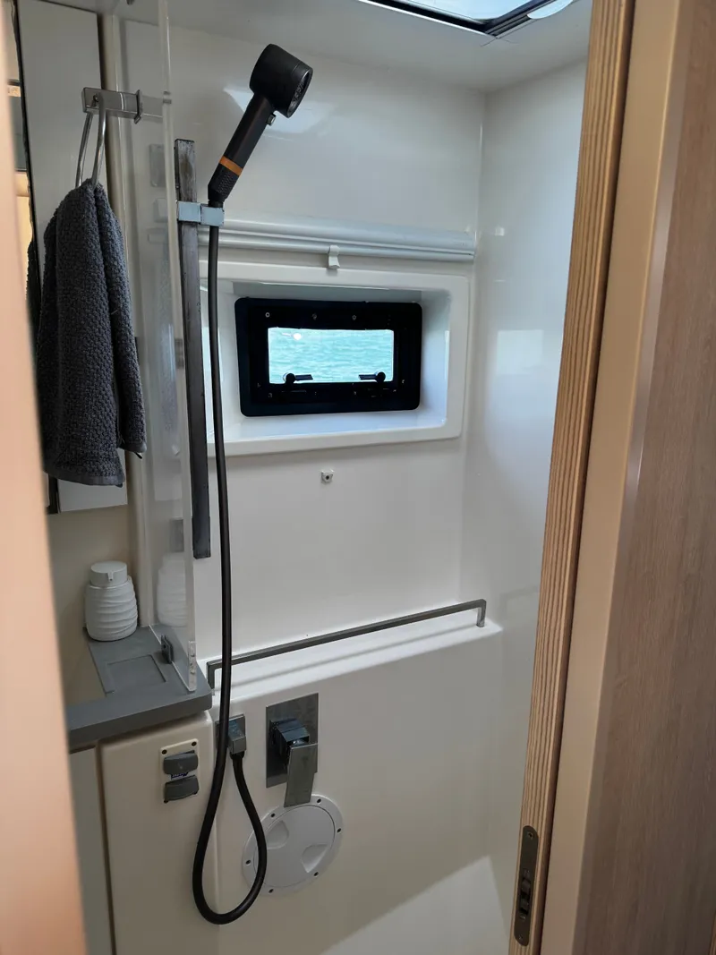 Slide: The Image of Interior view of shower on a 2019 Leopard 45 catamaran. - 23