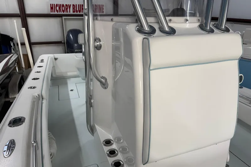 Slide: The Image of 2021 Contender 25 Tournament boat interior with rod holders and seating. - 20