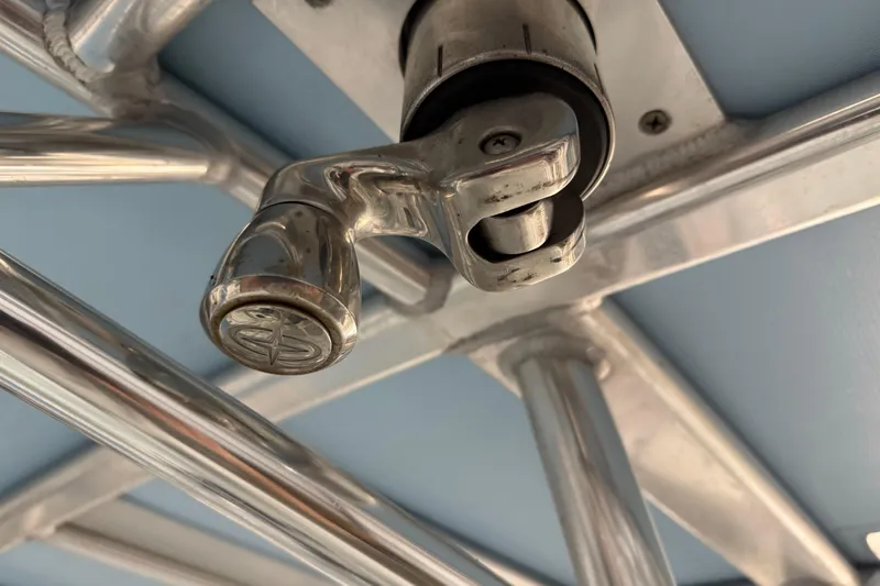 Slide: The Image of Stainless steel fitting on 2021 Contender 25 Tournament boat, close-up view. - 23