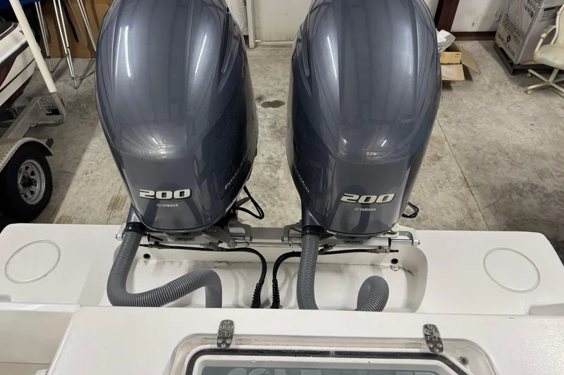 Slide: The Image of Twin Yamaha 200 engines on a 2021 Contender 25 Tournament boat. - 26