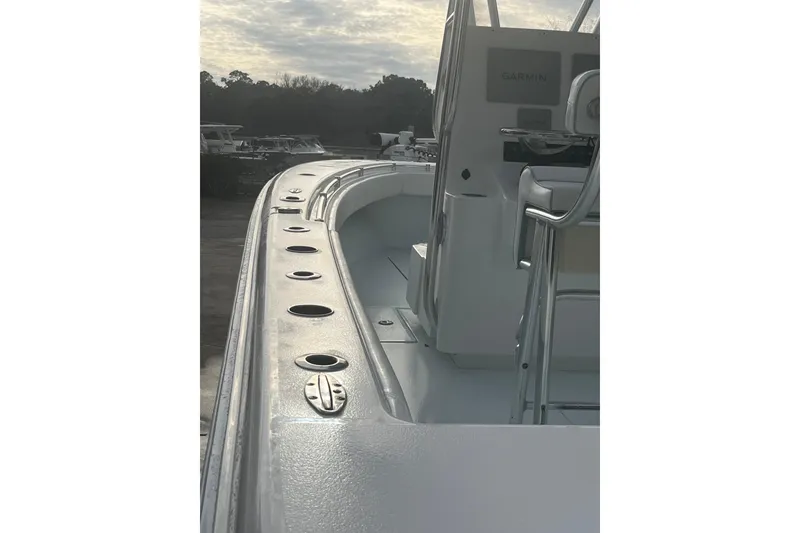 Slide: The Image of 2021 Contender 25 Tournament boat deck with rod holders and Garmin equipment. - 30