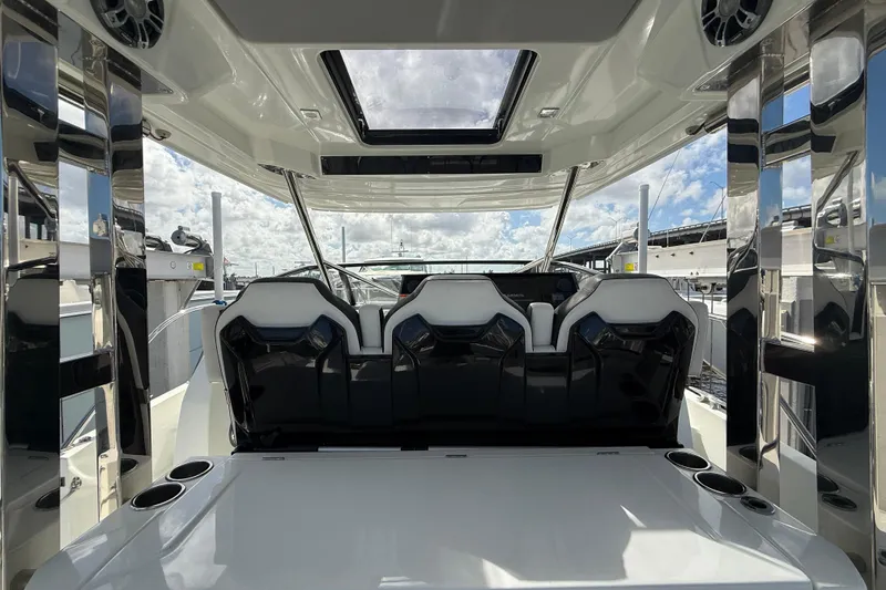 Slide: The Image of 2022 Jeanneau Leader 10.5 WA Series 2 boat interior with sleek seating and modern design. - 10
