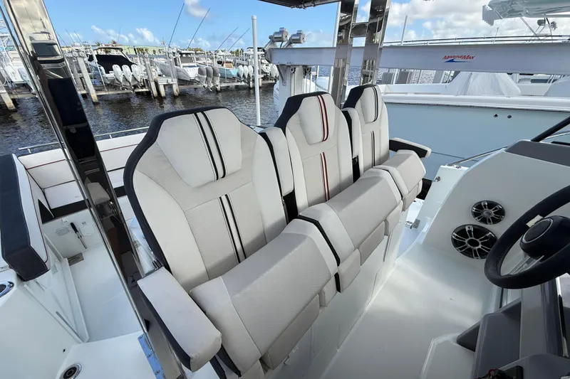 Slide: The Image of 2022 Jeanneau Leader 10.5 WA Series 2 boat interior with plush seating and modern design. - 16
