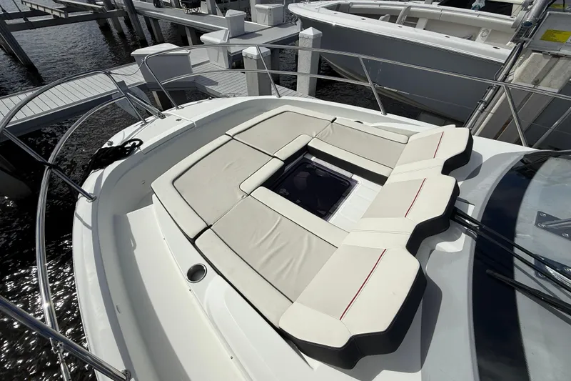 Slide: The Image of 2022 Jeanneau Leader 10.5 WA Series 2 boat with spacious sunbathing deck at marina. - 17