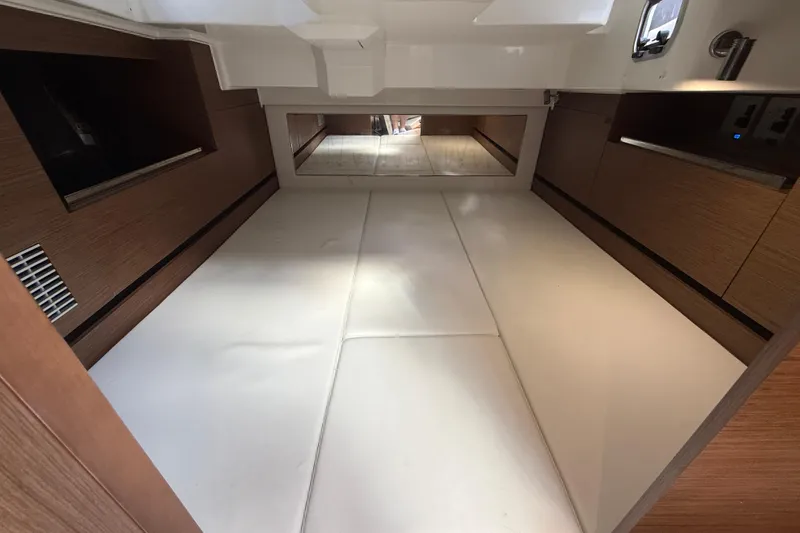 Slide: The Image of Interior cabin of 2022 Jeanneau Leader 10.5 WA Series 2, featuring sleek wood finishes. - 20