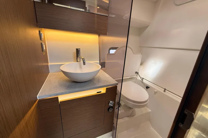 Slide: The Image of 2022 Jeanneau Leader 10.5 WA Series 2 bathroom with modern sink and toilet. - 21