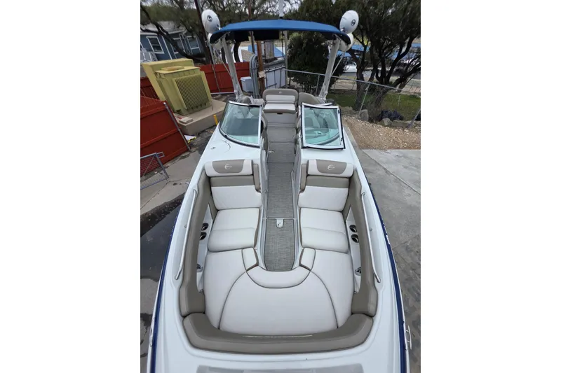 Slide: The Image of 2022 Crownline Eclipse E255 boat with spacious seating and sleek design. - 72