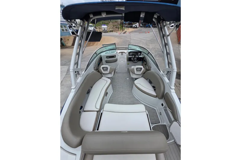 Slide: The Image of 2022 Crownline Eclipse E255 boat interior with spacious seating and modern design. - 73