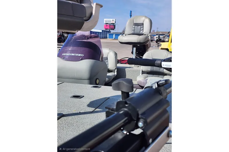 Slide: The Image of 2018 Tracker Pro 170 boat interior with seats and steering console. - 5