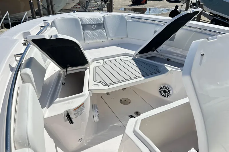 Slide: The Image of 2026 Sea Fox 288 Commander boat interior with open storage compartments and seating. - 20