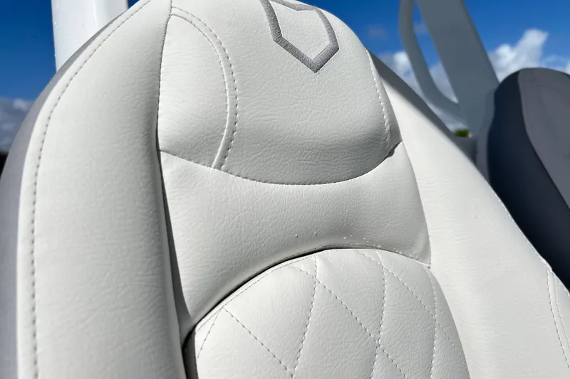 Slide: The Image of Close-up of 2026 Sea Fox 288 Commander white leather seat with stitching detail. - 22