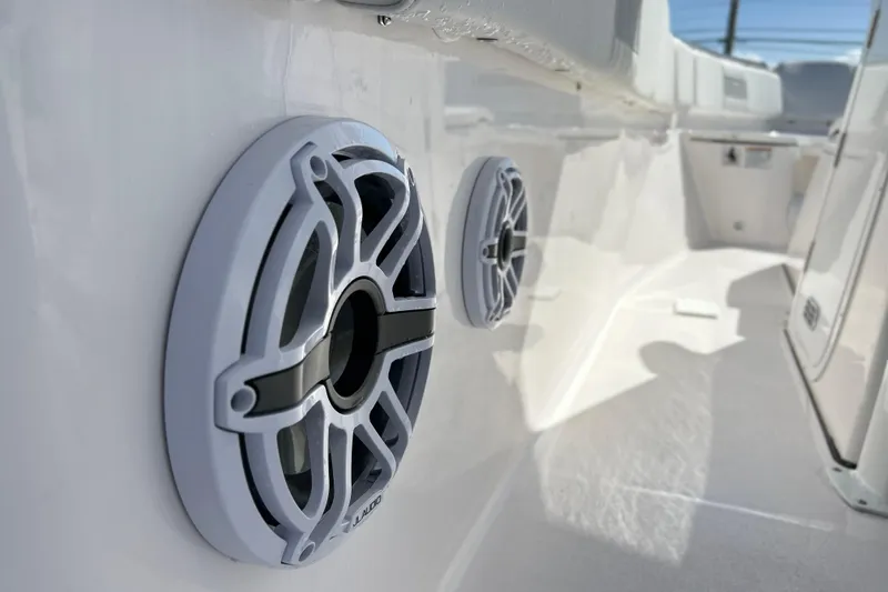 Slide: The Image of 2026 Sea Fox 288 Commander boat interior with marine speakers, showcasing sleek design. - 28