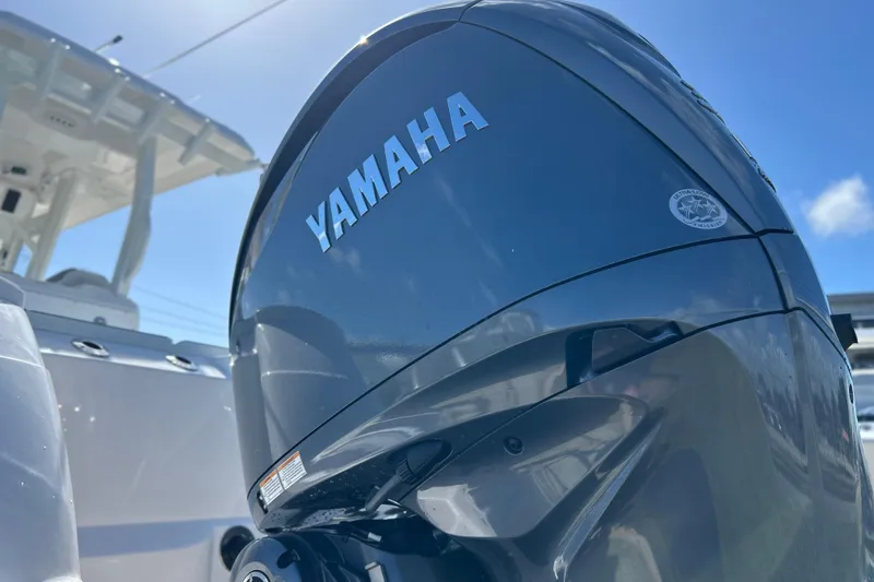 Slide: The Image of Yamaha outboard motor on 2026 Sea Fox 288 Commander boat under clear blue sky. - 34