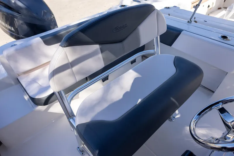 Slide: The Image of 2020 Robalo R202 Explorer boat seating and steering wheel detail. - 6