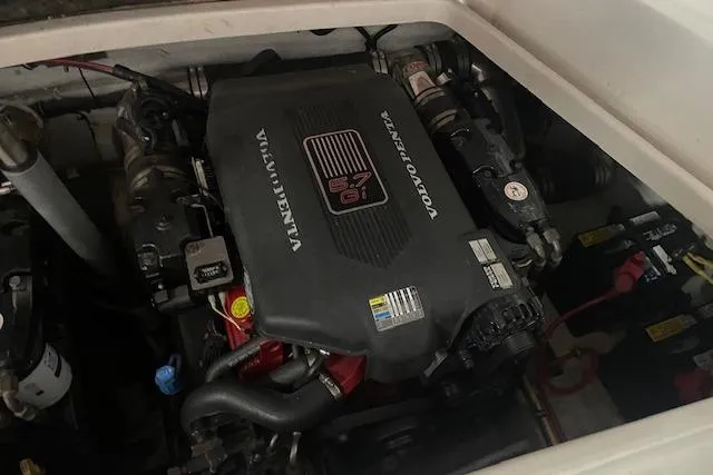 Slide: The Image of 2006 Chris-Craft Corsair 28 engine compartment featuring a Volvo Penta 8.1 engine. - 11