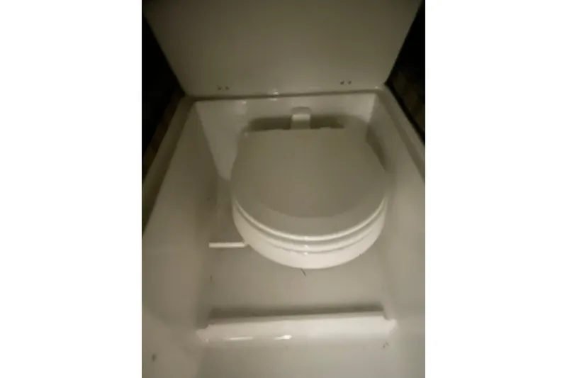 Slide: The Image of 2006 Chris-Craft Corsair 28 boat toilet interior view. - 14