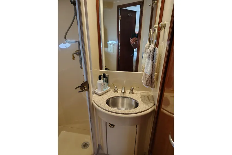 Slide: The Image of Bathroom interior of 2006 Meridian 459 Motoryacht with sink and shower. - 11