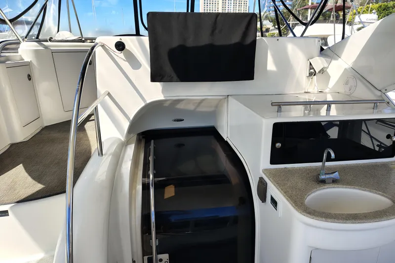 Slide: The Image of 2006 Meridian 459 Motoryacht interior with sink and seating area. - 19
