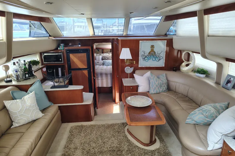 Slide: The Image of Luxurious interior of 2006 Meridian 459 Motoryacht with elegant seating and decor. - 2