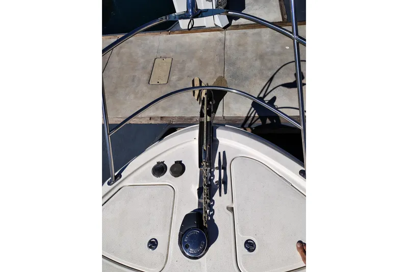 Slide: The Image of Bow view of 2006 Meridian 459 Motoryacht with anchor and deck details. - 23