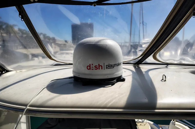 Slide: The Image of Satellite dish on 2006 Meridian 459 Motoryacht, providing onboard entertainment. - 29