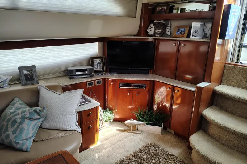 Slide: The Image of Luxurious interior of 2006 Meridian 459 Motoryacht with elegant wood cabinetry and cozy seating. - 3