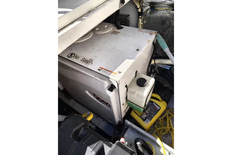 Slide: The Image of Engine compartment of 2006 Meridian 459 Motoryacht with equipment and maintenance items. - 31
