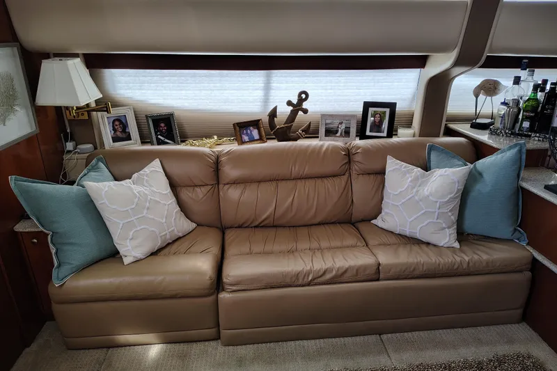 Slide: The Image of Luxurious interior of 2006 Meridian 459 Motoryacht with leather sofa and decorative pillows. - 5