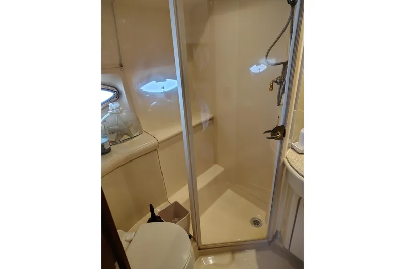 Slide: The Image of Bathroom interior of 2006 Meridian 459 Motoryacht with shower and toilet. - 9