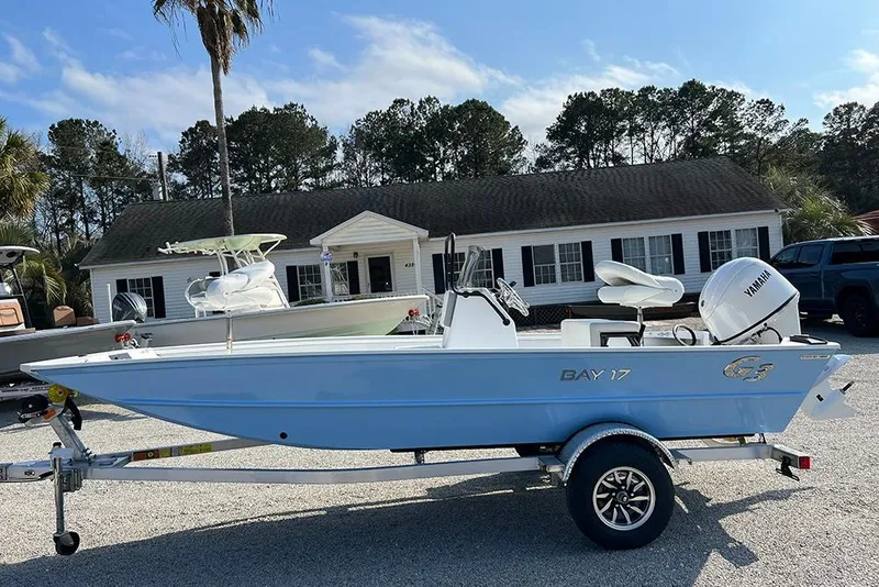 The Image of 2026 G3 Bay 17 boat on trailer, parked in front of a house. - 0