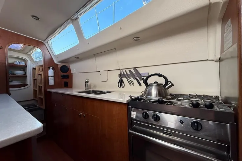 Slide: The Image of Interior of 2013 Gemini Legacy 35 yacht kitchen with stove, sink, and utensils. - 20