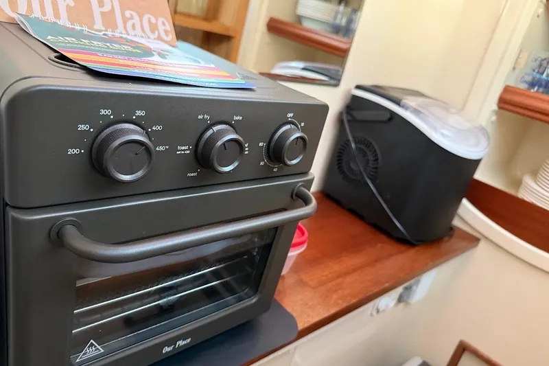 Slide: The Image of Compact kitchen setup with air fryer and ice maker on Gemini Legacy 35 yacht. - 25