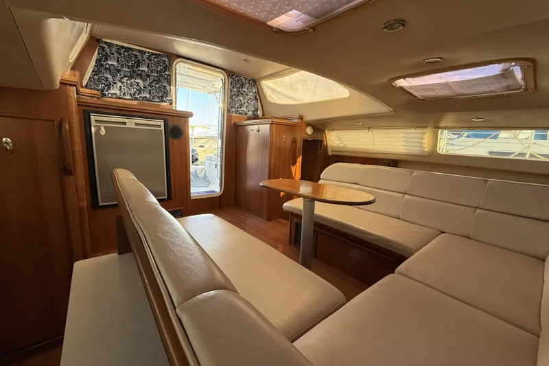 Slide: The Image of Interior of 2013 Gemini Legacy 35 yacht with beige seating and wooden accents. - 5