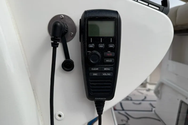 Slide: The Image of Garmin marine radio on 2022 Tidewater 292 CC Adventure boat dashboard. - 20