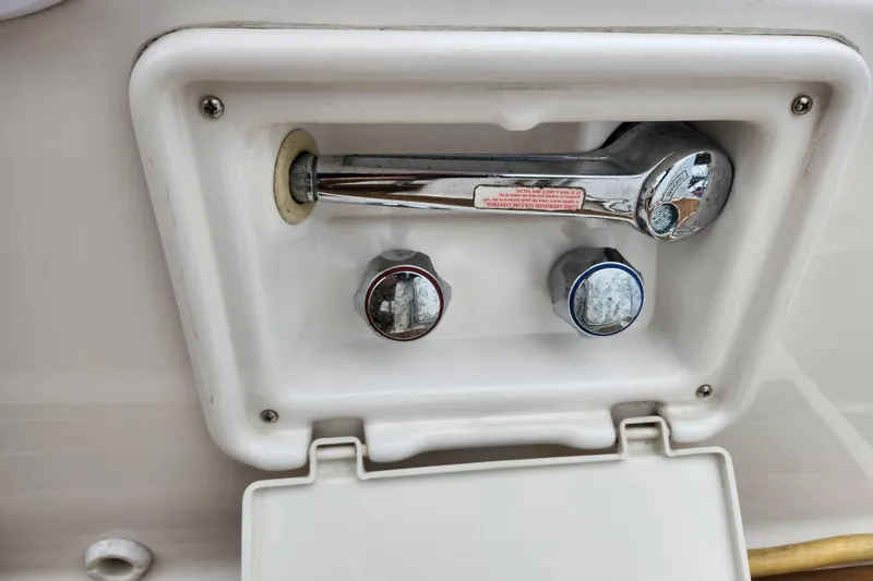 Slide: The Image of 2011 Regal 3060 Express Cruiser speaker and storage compartment detail. - 17